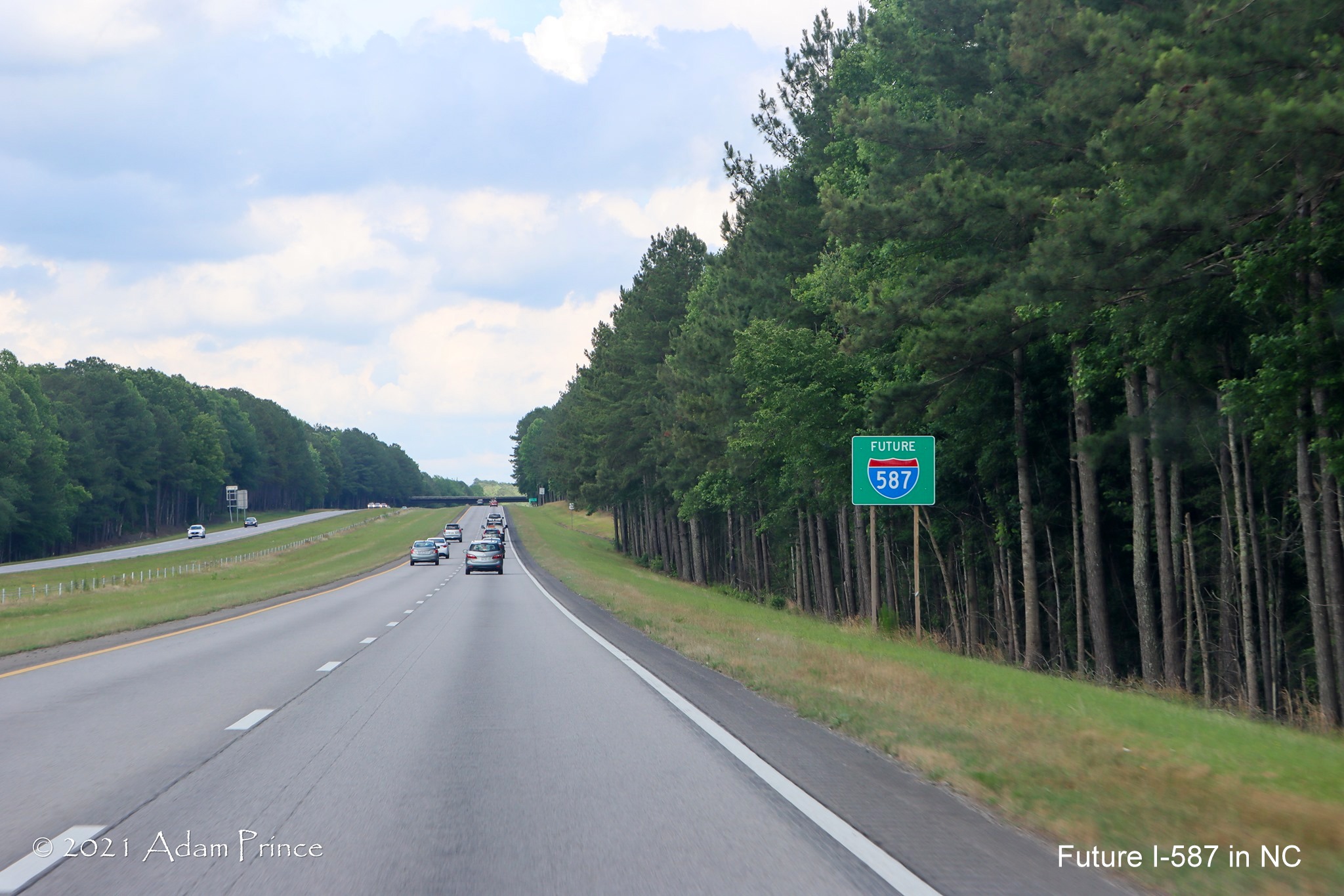 Image of Future I-587 sign at county line on US 264 East, photo by Adam Prince, 
	June 2021
