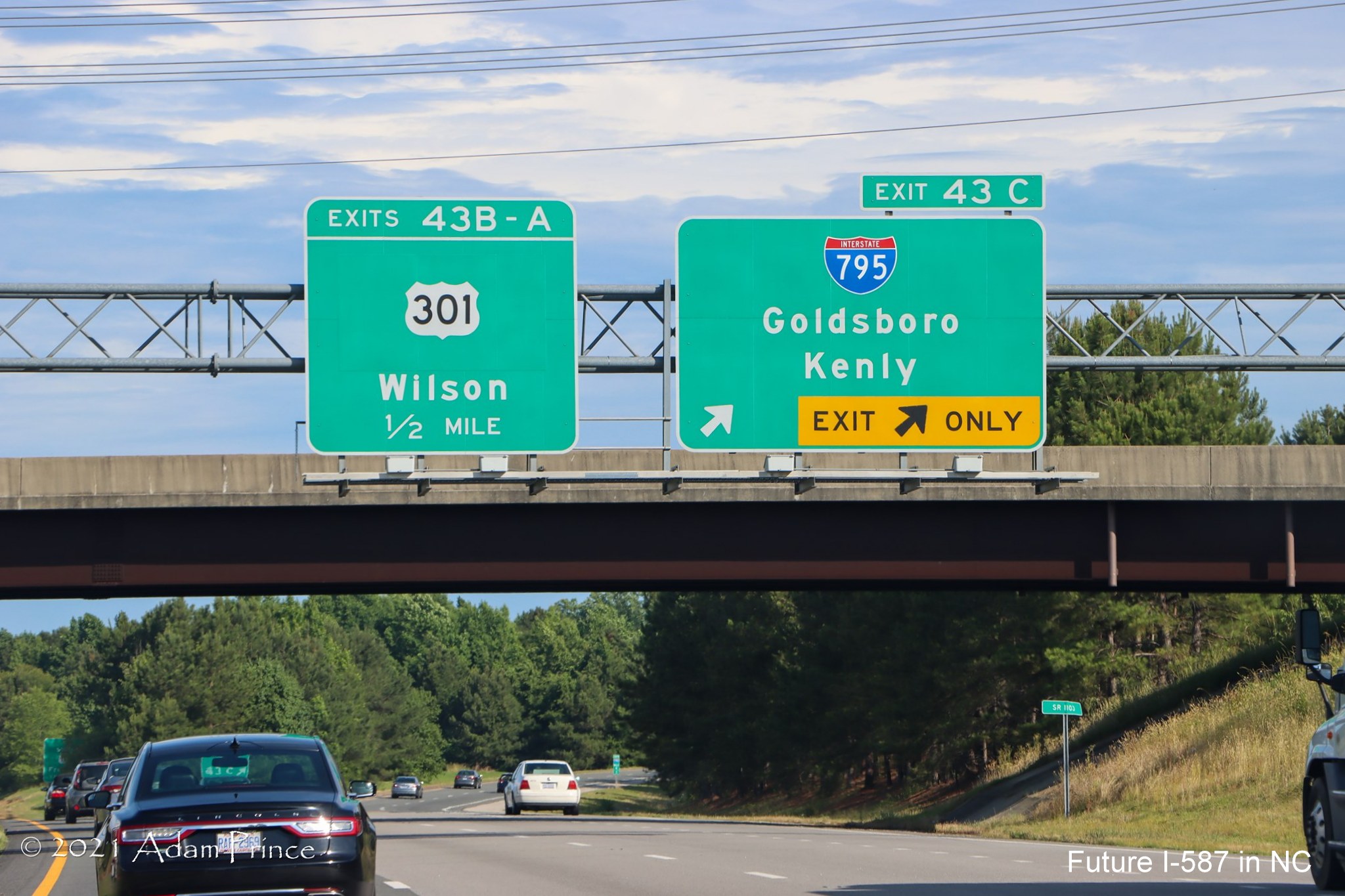 Overhead signage at ramp for I-795 South exit on US 264 (Future I-587) East
	in Wilson, photo by Adam Prince, June 2021