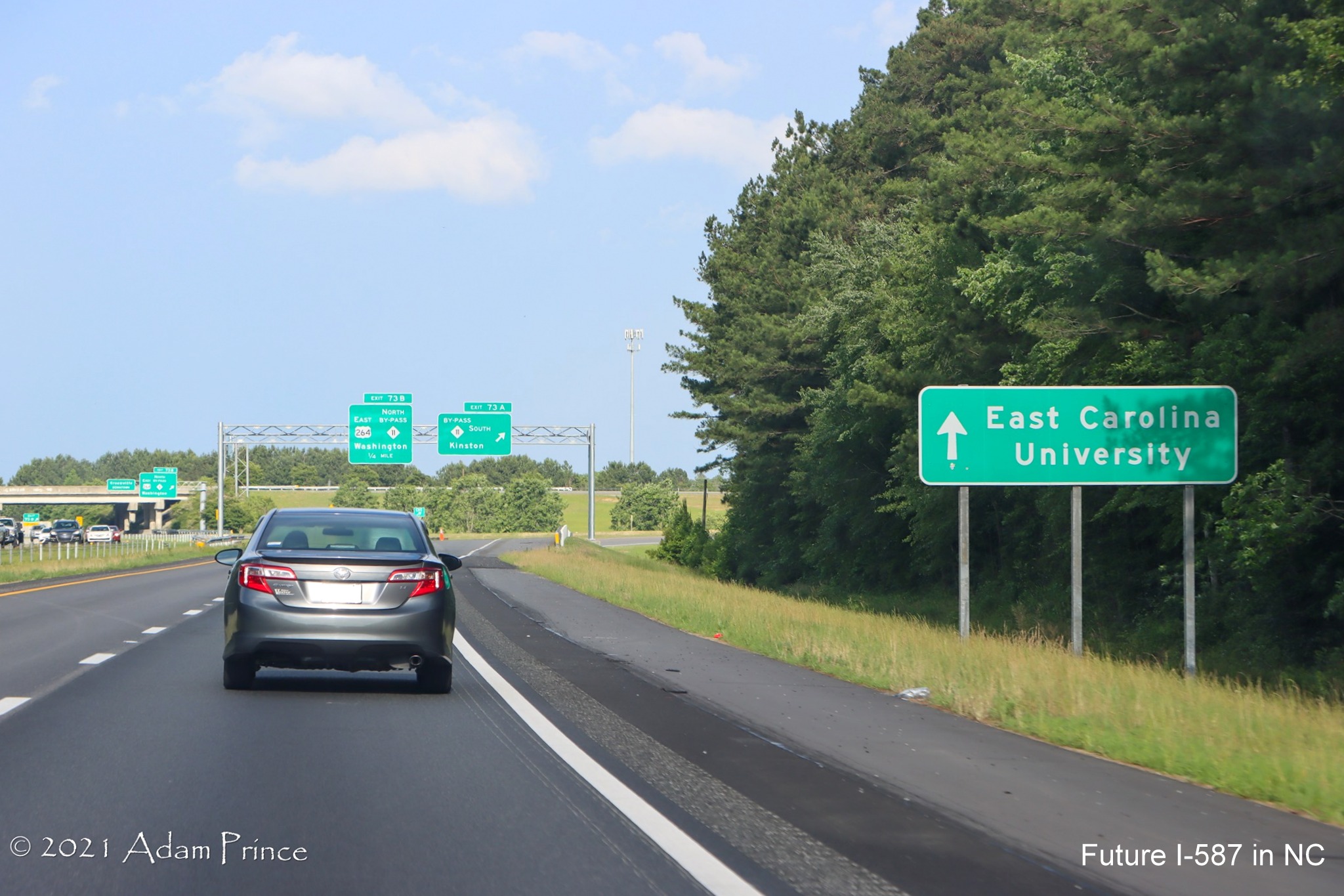 Image of auxiliary sign for US 264 East/NC 11 Greenville Bypass exit on US 264 
	East (Future I-587 South) in Greenville, photo by Adam Prince, June 2021