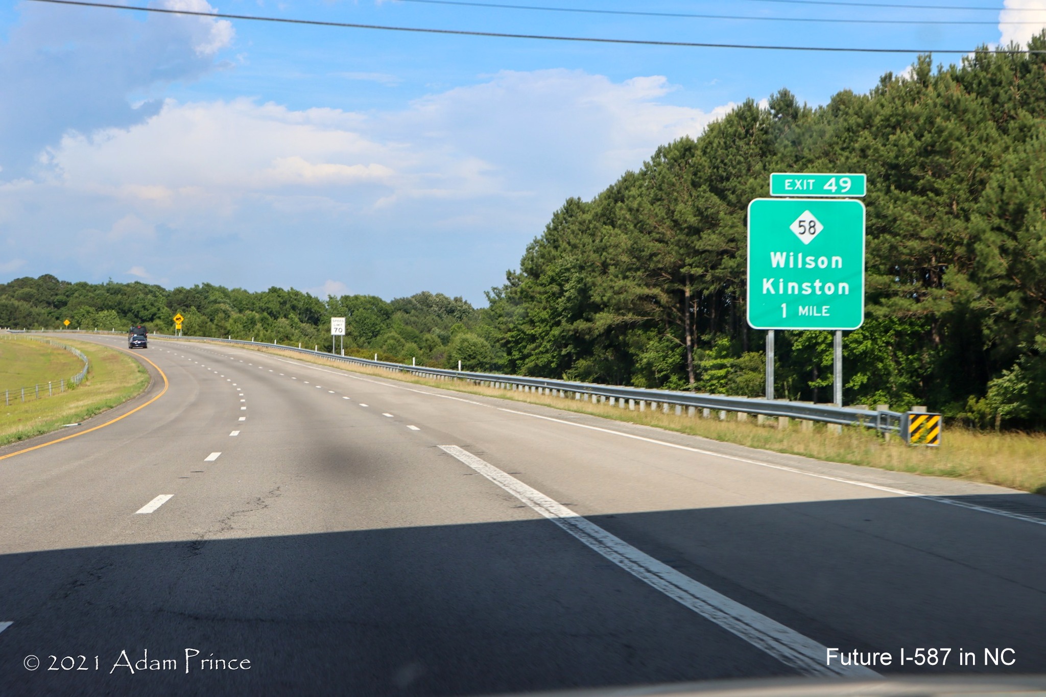 1 Mile advance sign for NC 58 exit on US 264 East (Future I-587 East) in Wilson, 
	photo by Adam Prince, June 2021
