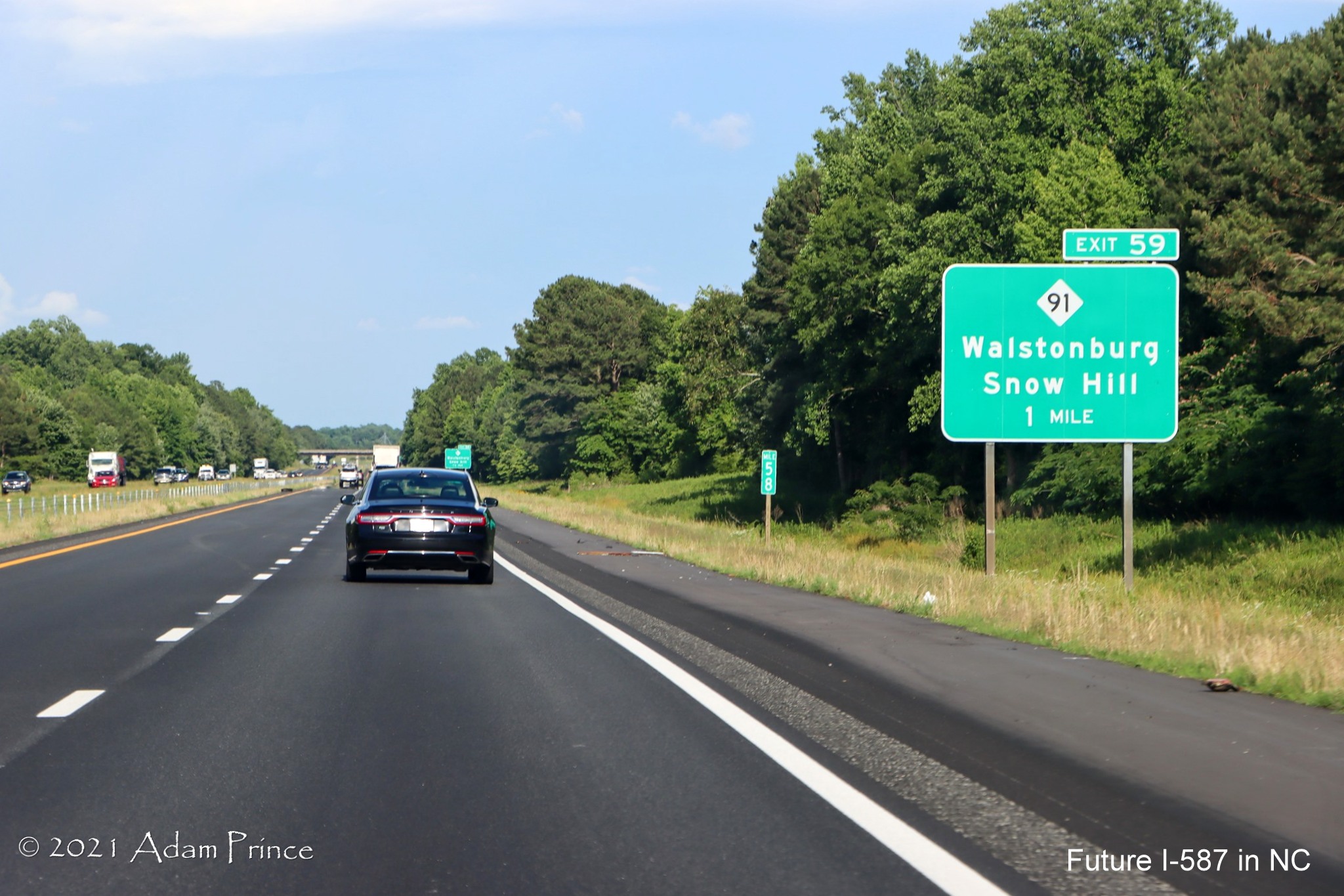 1 Mile advance sign for NC 91 exit on US 264 East (Future I-587 South) in 
	Walstonburg, photo by Adam Prince, June 2021
