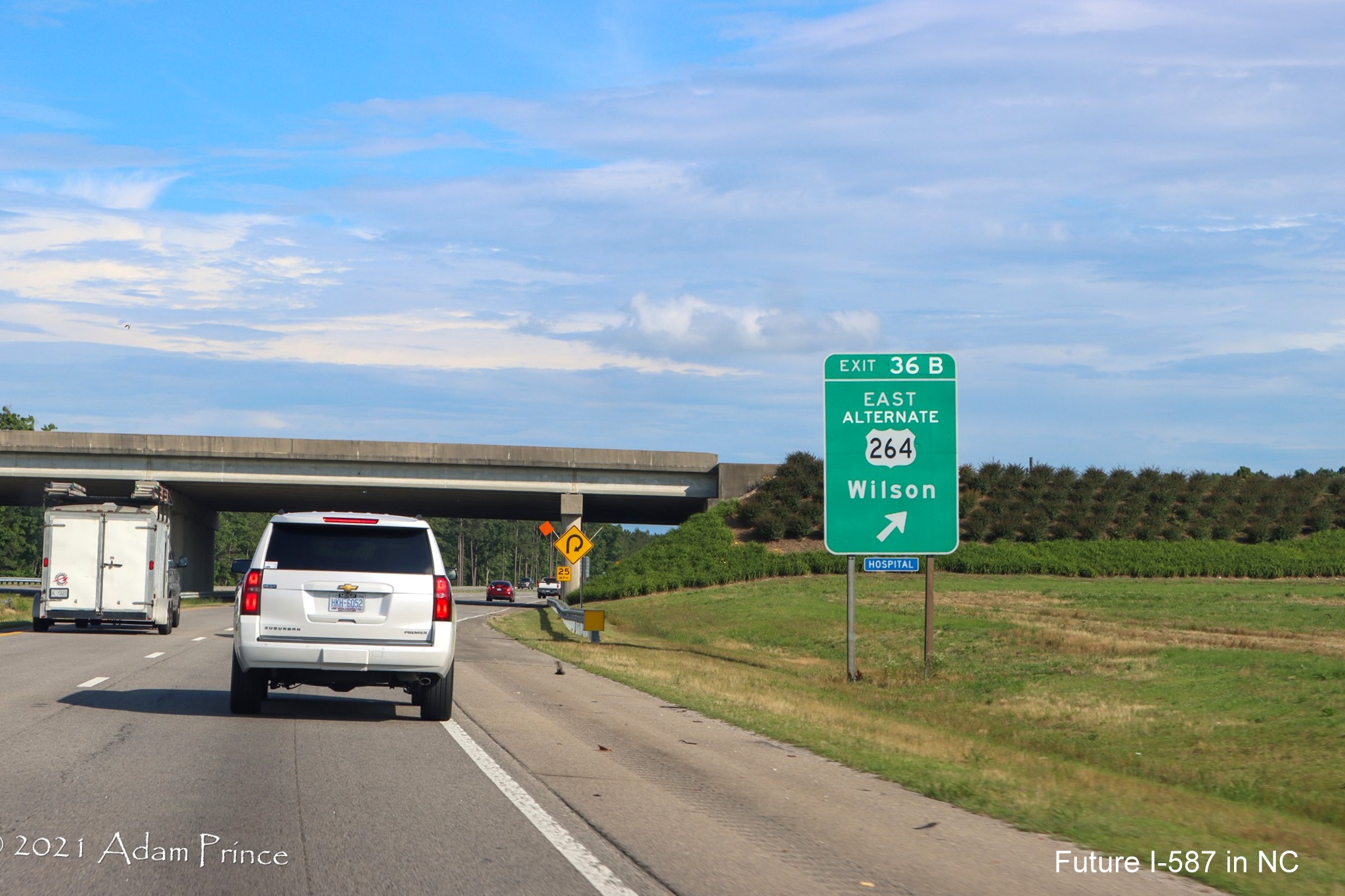 Ground mounted ramp sign for East US 264 Alternate exit on US 264 (Future I-587) East 
	in Sims, photo by Adam Prince, June 2021