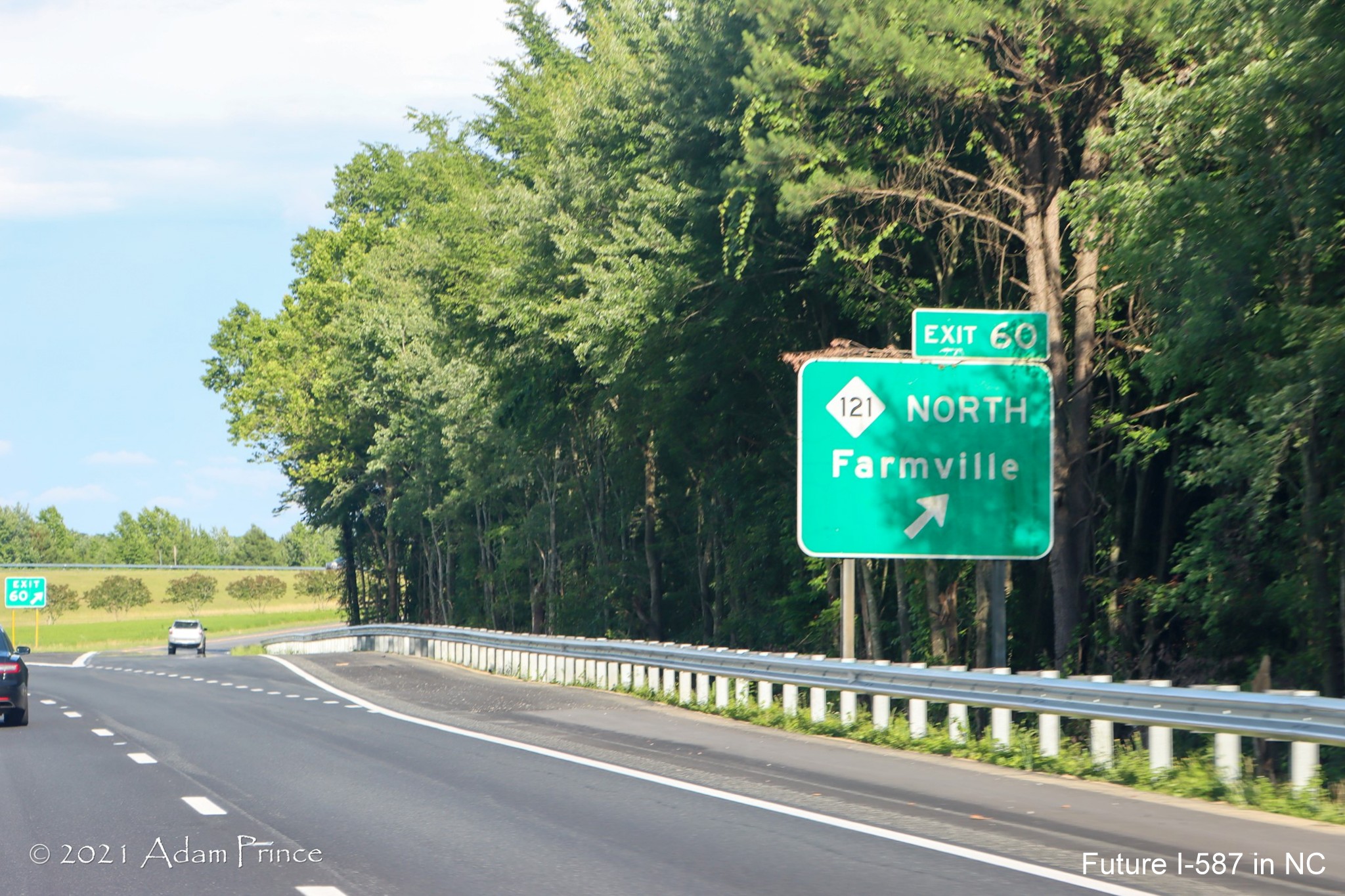 Ground mounted ramp sign for NC 121 North exit on US 264 East (Future I-587 South) 
	in Farmville, photo by Adam Prince, June 2021