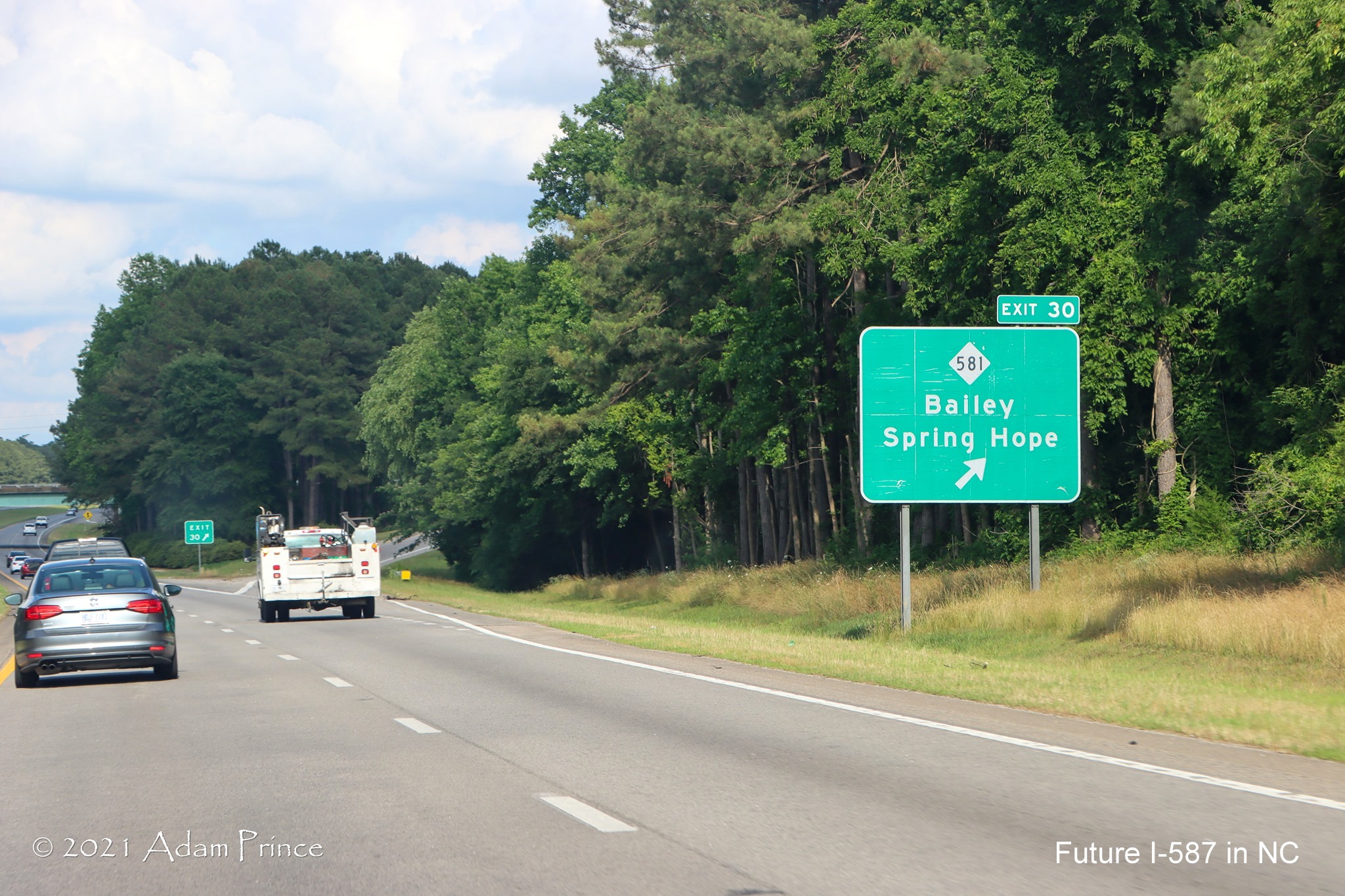 Ground mounted ramp sign for NC 58 exit on US 264 West (Future I-587 North) 
	in Bailey, photo by Adam Prince, June 2021