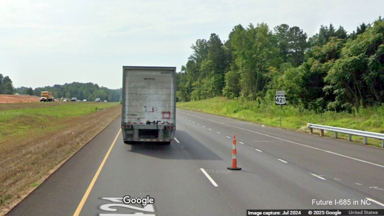 Image of new US 421 South reassurance marker after ramp for Julian Airport Road on US 421 (Future
I-685) South, Google Maps Street View, July 2024