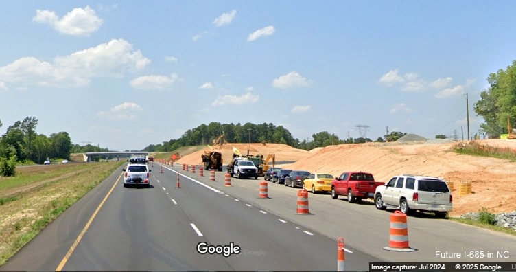 Image of still under construction exit ramp for Julian Airport Road on US 421 (Future I-685) North,
Google Maps Street View, July 2024