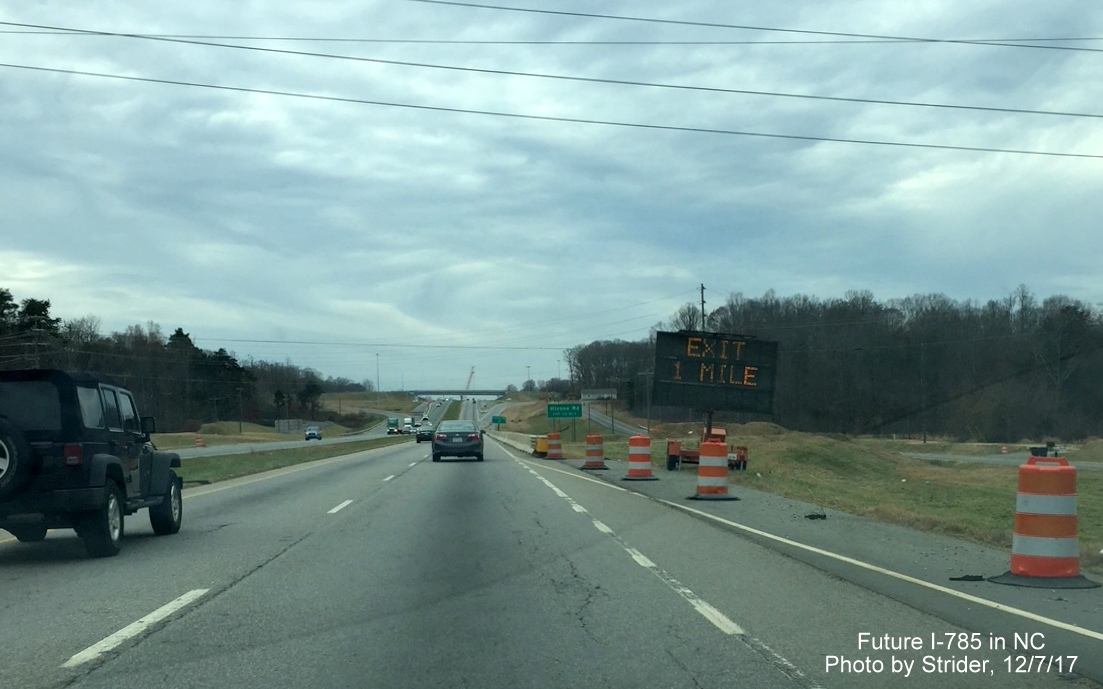 Image of ground mounted 1/2 mile advance sign for Hicone Road exit on US 29 (Future I-785) South in Greensboro, photo by Strider, December 2017