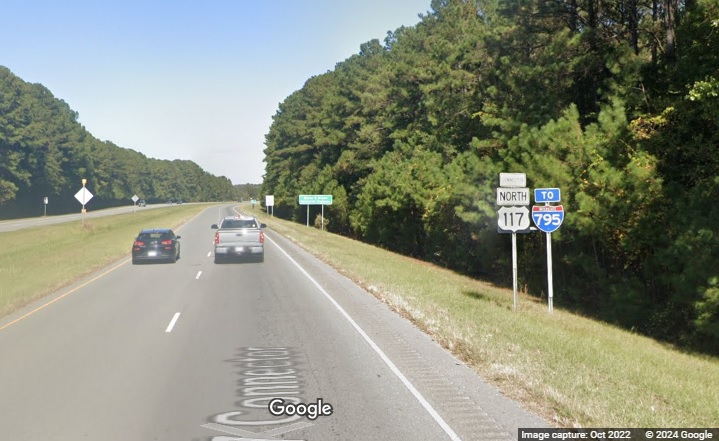 Image of signage along US 117 Connector including a To I-795 trailblazer in Faison, Google Maps Street View, October 2022