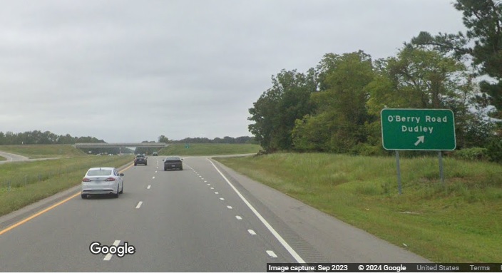 Image of ground mounted ramp sign for O'Berry Road exit on US 117 (Future I-795) 
	  South in Goldsboro, Google Maps Street View, September 2023