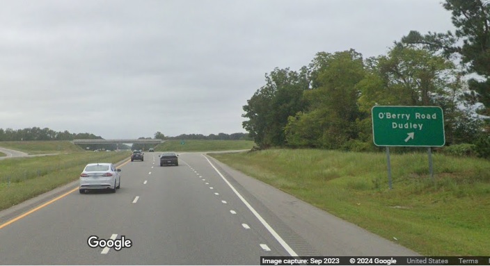 Image of ground mounted ramp sign for O'Berry Road exit on US 117 (Future I-795) South in Goldsboro, Google Maps Street View, September 2023