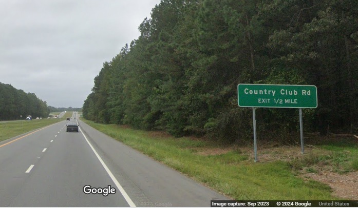 The 1/2 Mile advance sign for the Country Club Road exit on US 117 (Future I-795) South 
	  in Goldsboro, Google Maps Street View, September 2023
