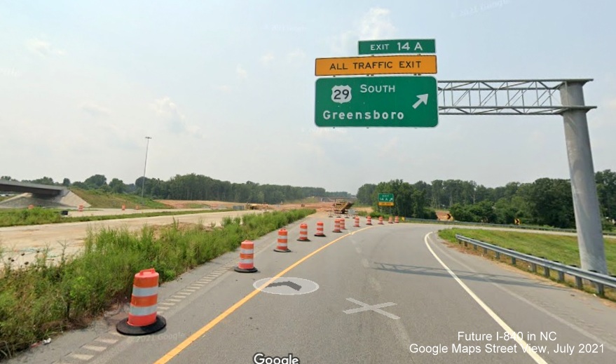 Image of overhead ramp sign at current end of I-785/Greensboro Urban Loop showing grading for future I-840 section underway, Google Maps Street View, July 2021