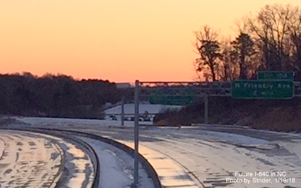 Image of newly placed overhead 2 mile advance exit sign for W. Friendly Ave. on soon to open I-840 West/Greensboro Loop at Bryan Blvd, by Strider