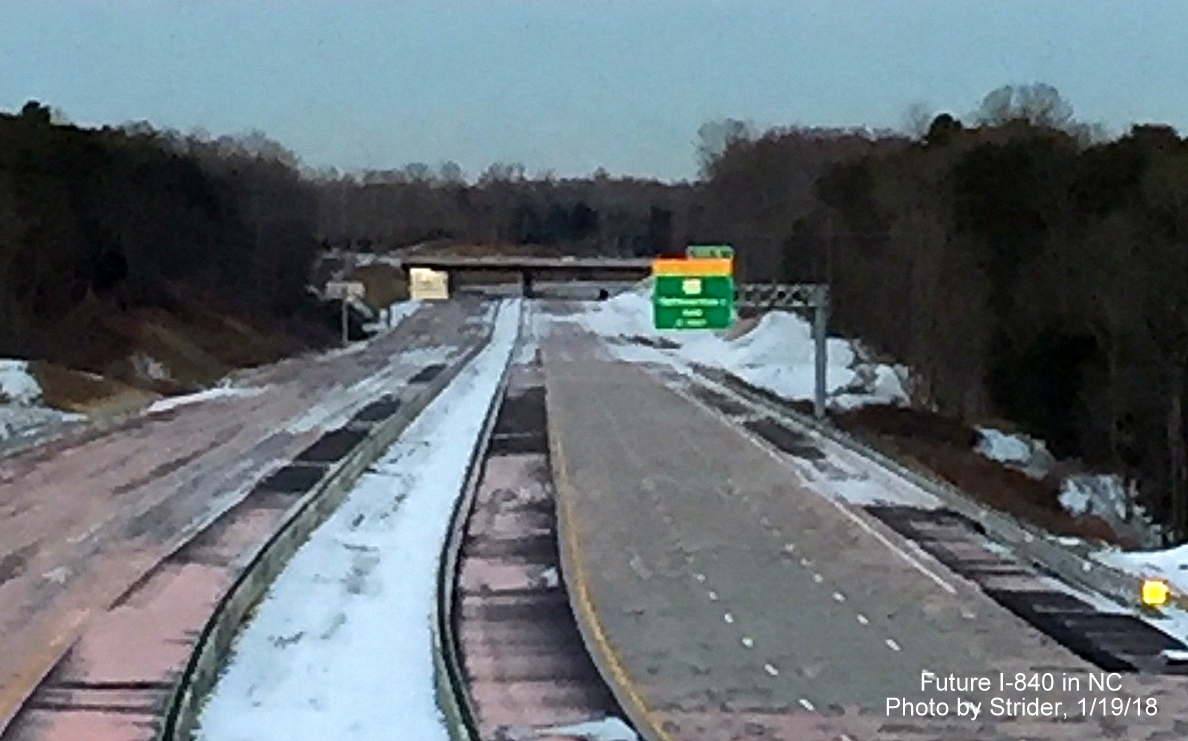 Image of newly placed overhead 2-mile advance sign for US 220/Battleground Ave exit on soon to be opened section of I-840 East/Greensboro Loop, by Strider