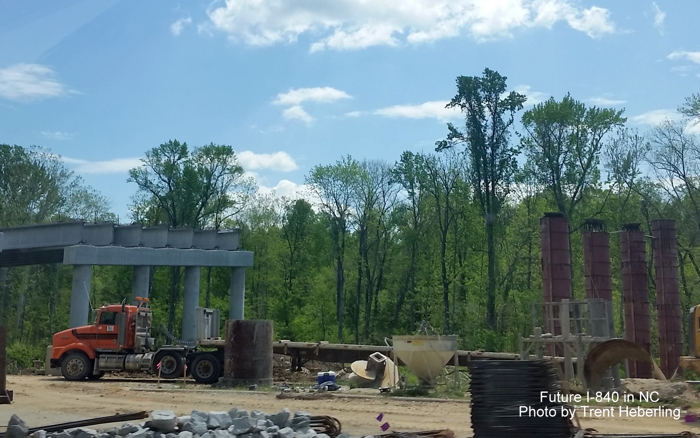 Image of supports being placed for future I-840 Greensboro Loop near Drawbridge Pkwy in Greensboro, by Trent Heberling