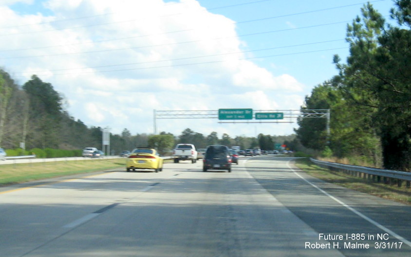 Image of overhead exit signage at Ellis Road exit on NC 147 (Future I-885) South in Durham