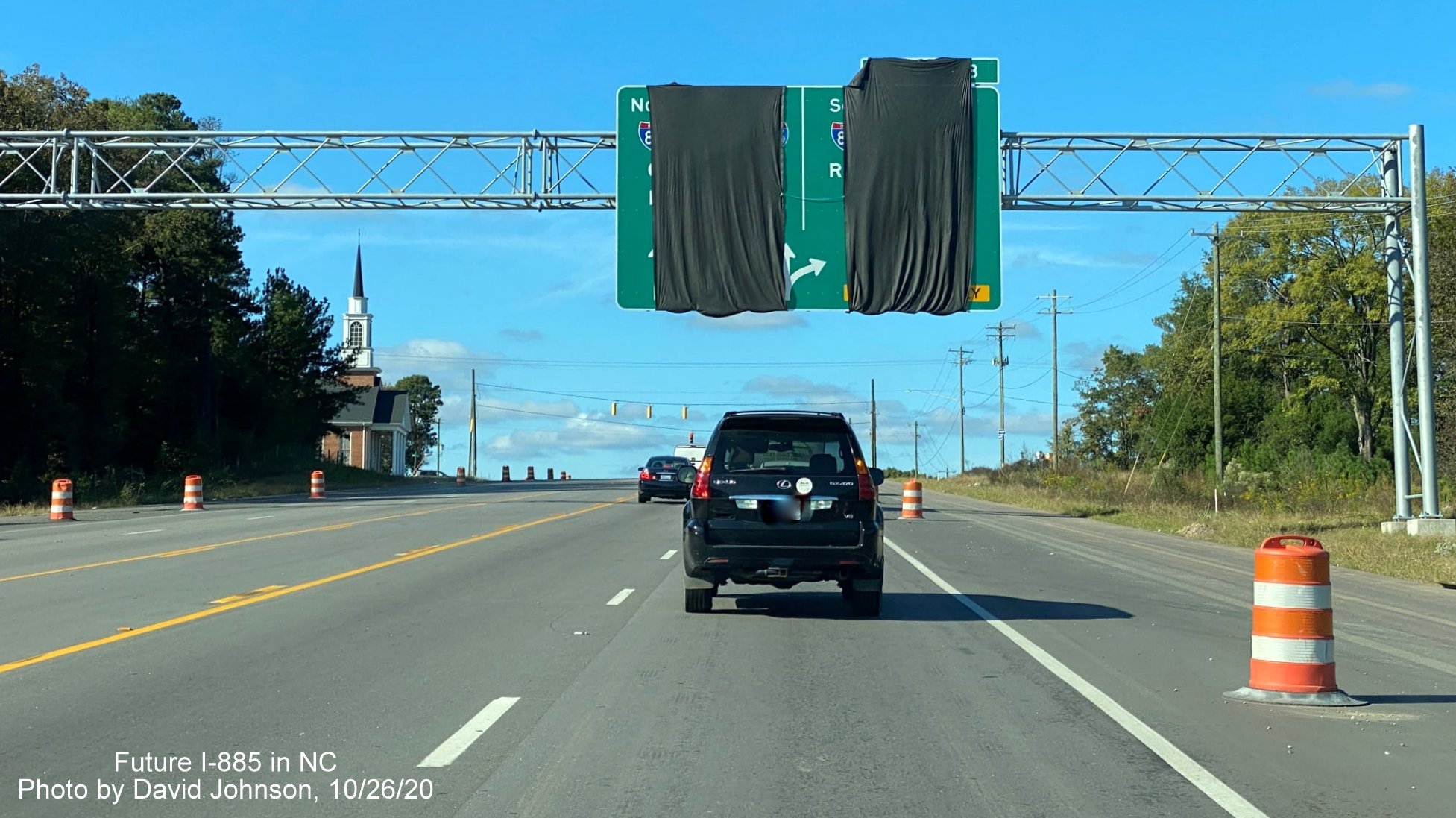 Image of new overhead sign structure over widened US 70 east of Lynn Road prior ro Future I-885/East End Connector interchange, by David Johnson October 2020