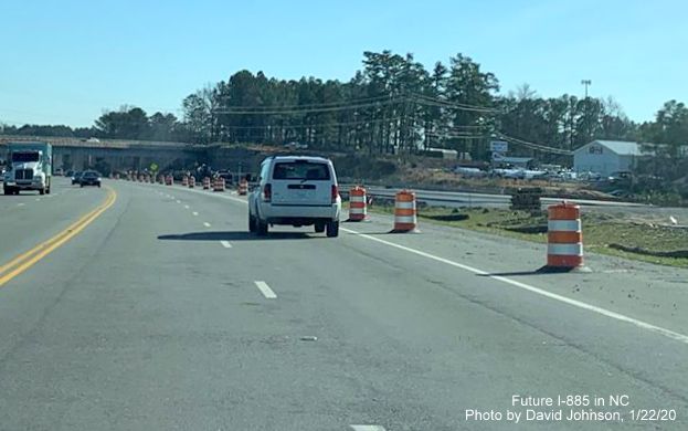 Image of future I-885 South lanes under construction alongside US 70 East approaching new railroad bridge as part of East End Connector project in Durham, by David Johnson