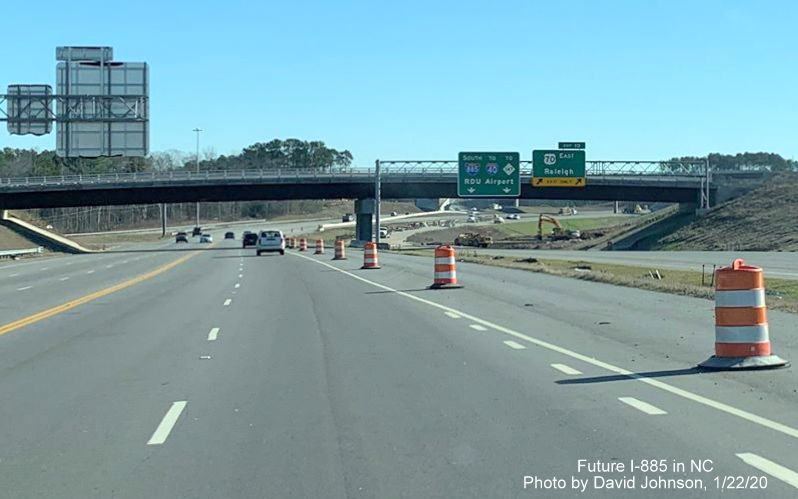 Image of traffic on US 70 East using Future I-885 North lanes with new sign gantry northbound now in place, by David Johnson