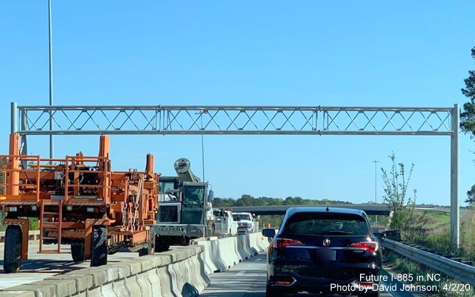 Image of newly placed overhead sign gantry for future I-885/East End Connector exit sign on NC 147 South in Durham, by David Johnson