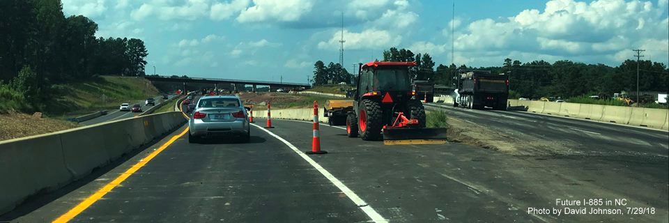 Image of lanes split between current and future US 70 West lanes prior to railroad bridge in East End Connector project work zone in Durham, by David Johnson