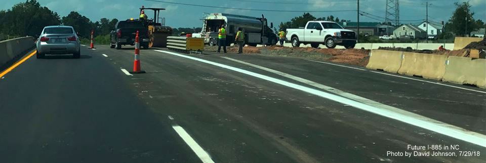 Image of construction of new US 70 West lanes in East End Connector Project work zone in Durham, by David Johnson