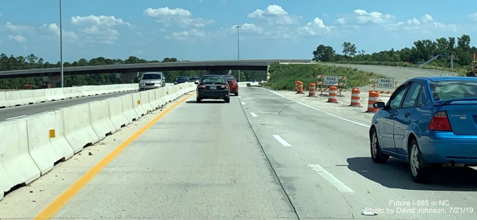 Image of NC 147 South traffic at future ramp to I-885 North in East End Connector Project work zone in Durham, by David Johnson
