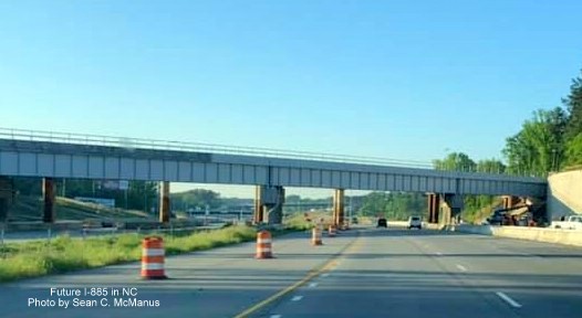 Image of still under construction railroad bridge over Future I-885 South/US 70 East in Durham, by Sean C. McManus, April 2021