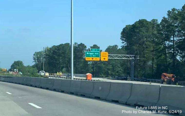 Image of newly placed overhead sign for Briggs Avenue exit on future NC 147 North lanes after East End Connector/I-885 exit in Durham, by Charles M. Kunz