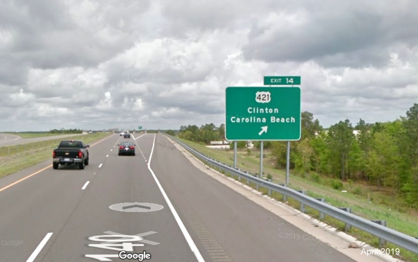 Google Maps Street View image of ground mounted ramp sign for US 421 (No longer with US 17 South) exit on I-140 East in Wilmington, taken in April 2019