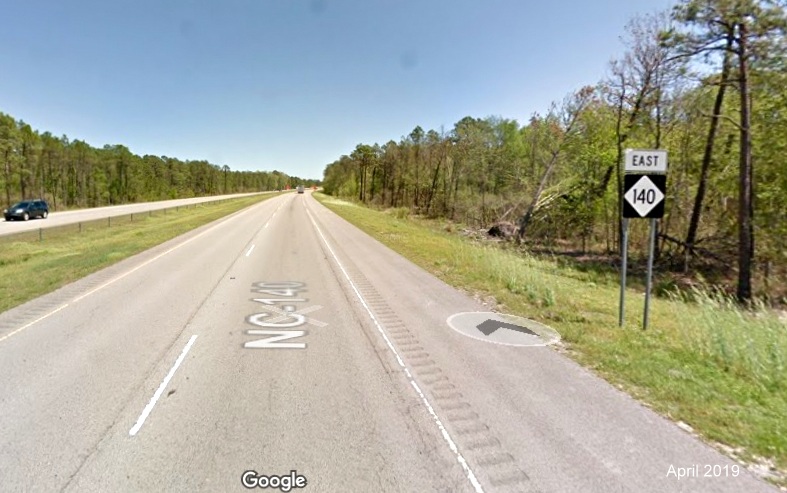 Google Maps Street View image of East NC 140 reassurance marker after I-40 exit in Wilmington, taken in April 2019