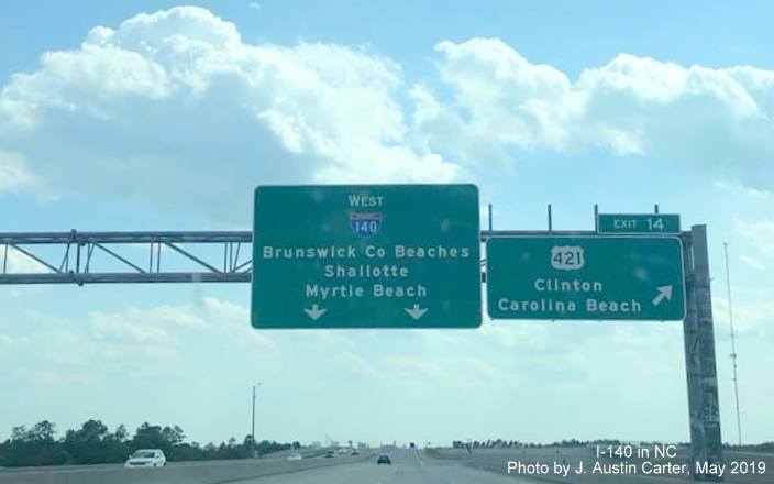 Image of overhead signage at US 421 exit ramp on I-140 West in Brunswick County, by J. Austin Carter
