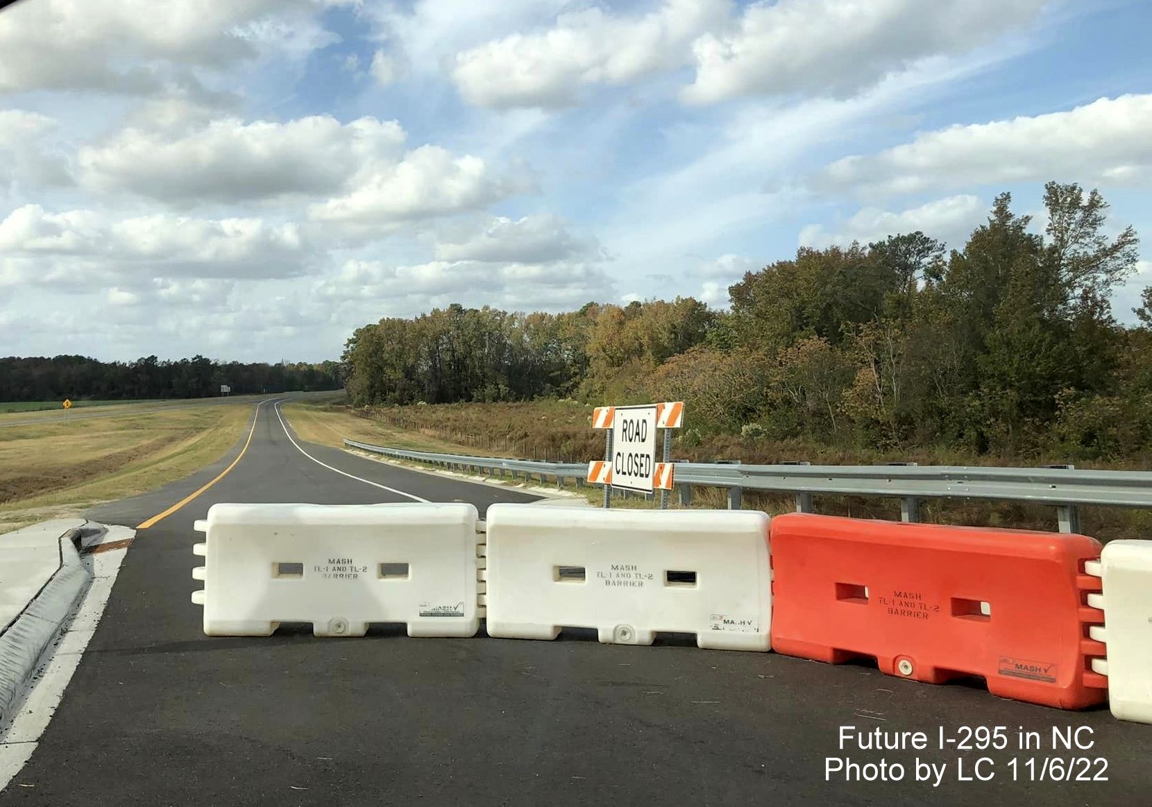Image of view looking west from Parkton Road roundabout to soon to be opened ramp to 
                                                 Fayetteville Outer Loop north to Black Bridge Road, by LC, November 2022
