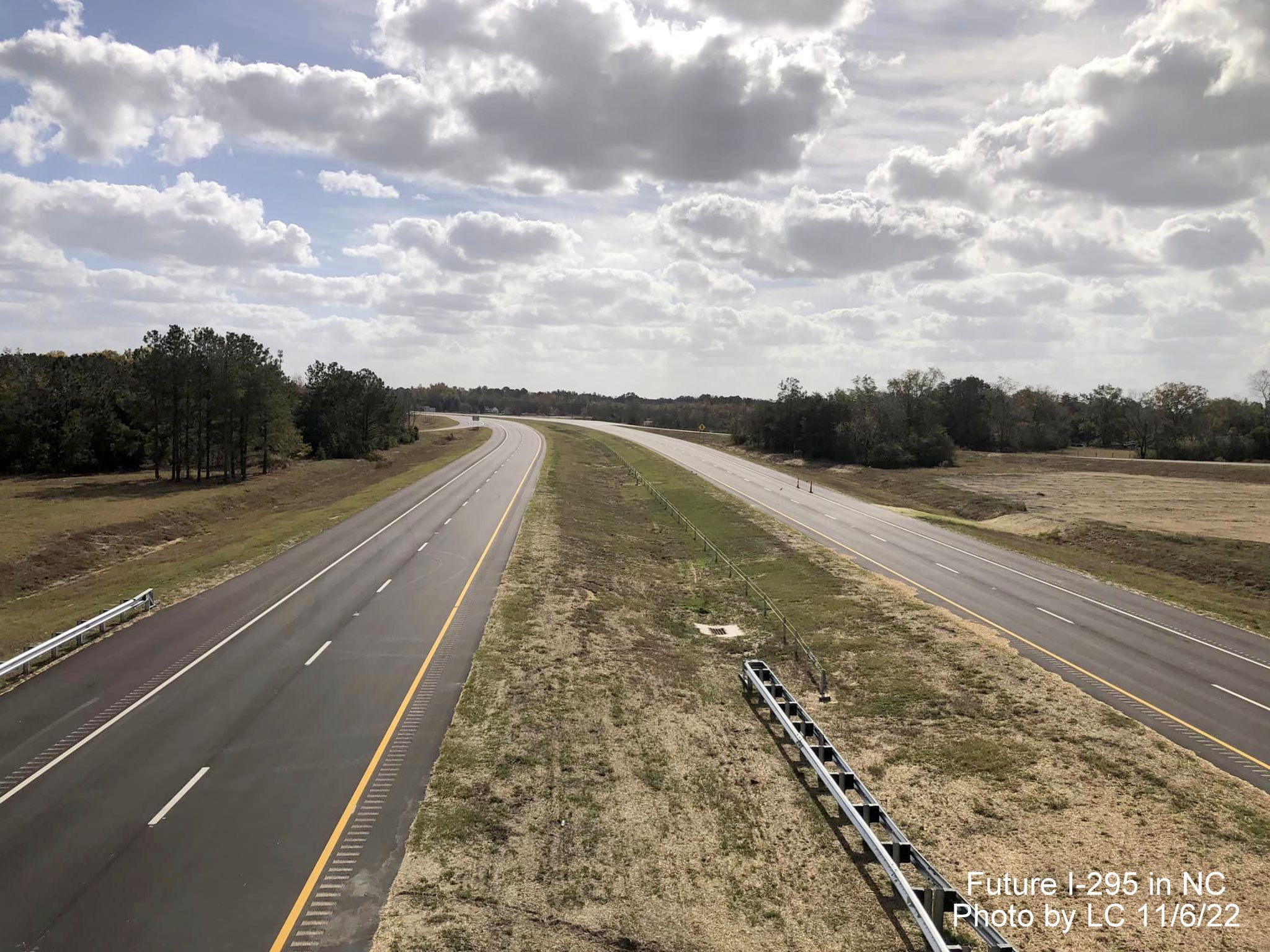 Image taken along Black Bridge Road bridge looking south to soon to
        be opened section of Fayetteville Outer Loop to Parkton/Leeper Roads, by LC, November 2022