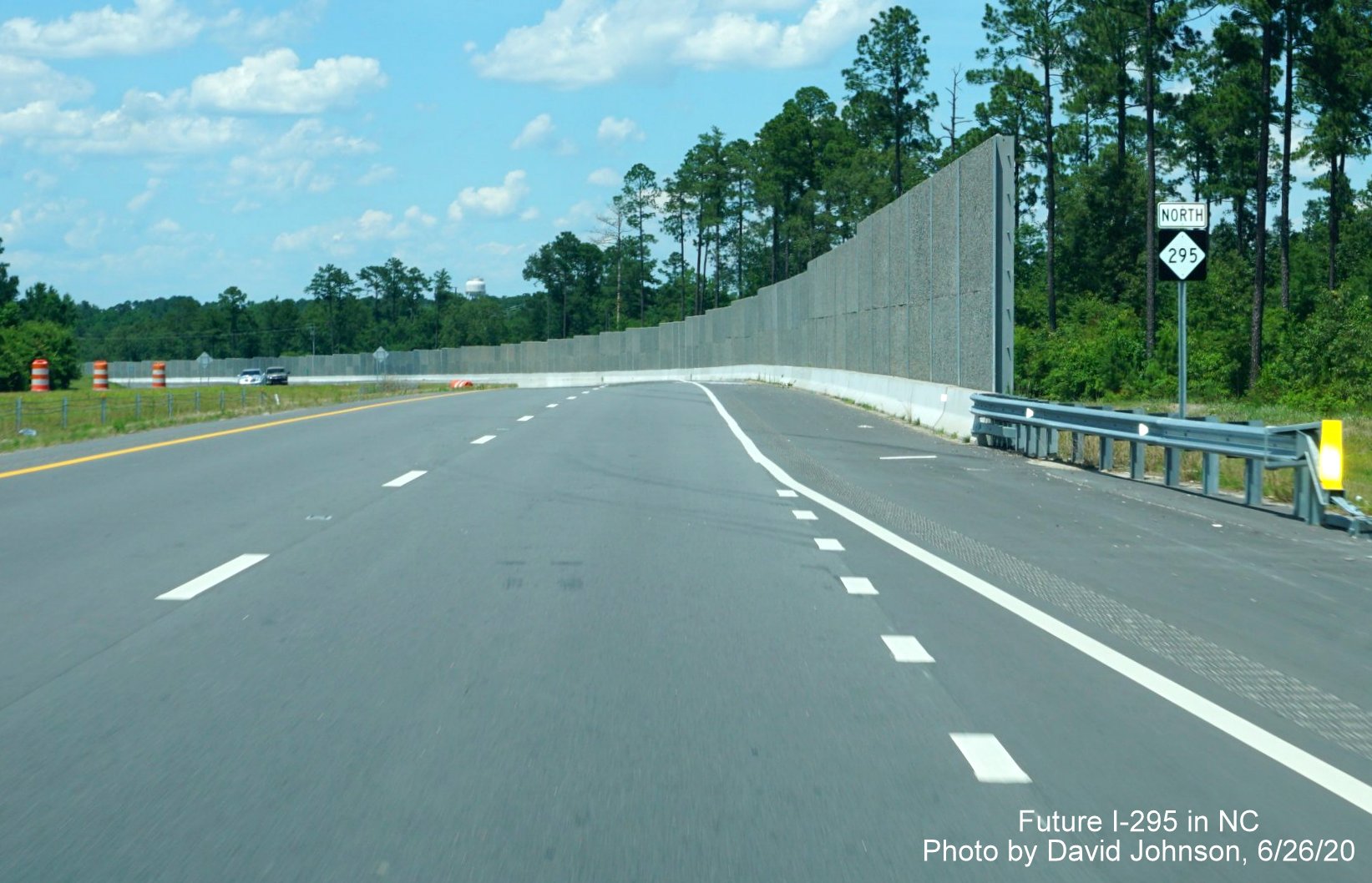 Image of first NC 295 reassurance marker and noise wall north of Cliffdale Road exit, by David Johnson 
        June 2020