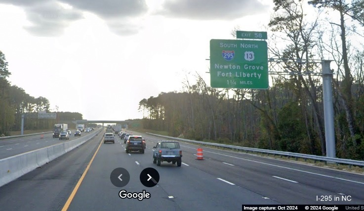 Image of recently placed 1 1/4 Mile advance overhead sign for -295 South/US 13 
	  North exit on I-95 South, Google Maps Street View, October 2024
