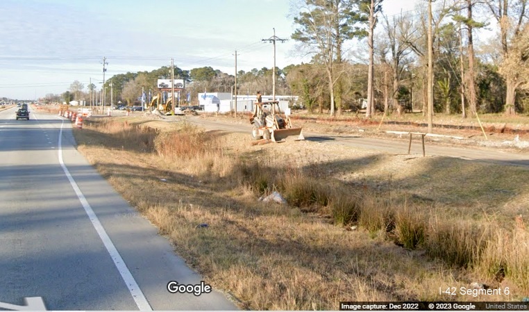 Image of service road construction along US 70 West in James City as part of conversion to Future I-42 freeway, Google Maps Street View, December 2022