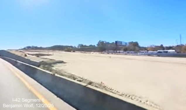 Image of looking back at grading going on for future Grantham Road bridge from
		US (Future I-42) West, screen grab from Benjamin Wolf video, December 2025