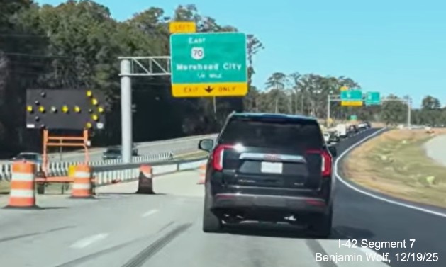 Image of new 1/4 Mile advance sign for US 70 (Future I-42) East at the end of 
	Business 70 West at the Havelock Bypass, Screen grab from Benjamin Wolf video, December 2025
