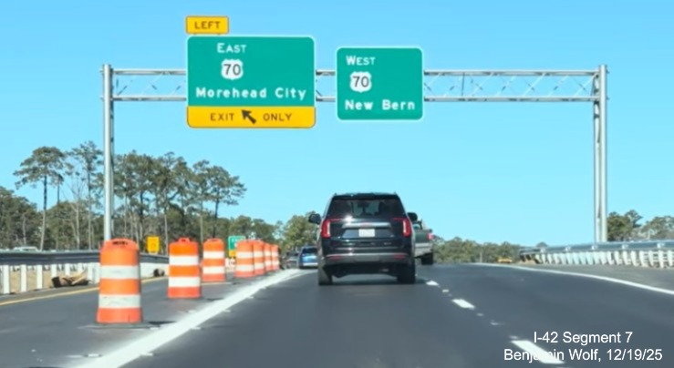 Image of future ramp to the Bypass east currently closed to traffic at the western
	end of the US 70 (Future I-42) Havelock Bypass, Screen grab from Benjamin Wolf video, December 2025
