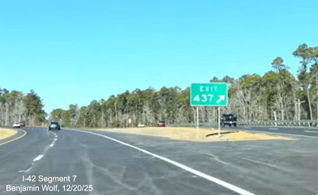 Image of gore sign for Business West US 70 exit prior to the 
	start of the US 70 (Future I-42) West Havelock Bypass, Screen grab from Benjamin Wolf video, December 2025