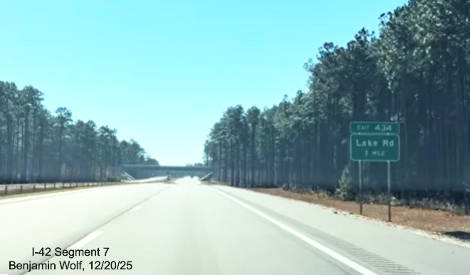 Image of the 1 mile ground mounted advance sign for the Lake Road exit on the US 70 
	(Future I-42) East Havelock Bypass, Screen grab from Benjamin Wolf video, December 2025