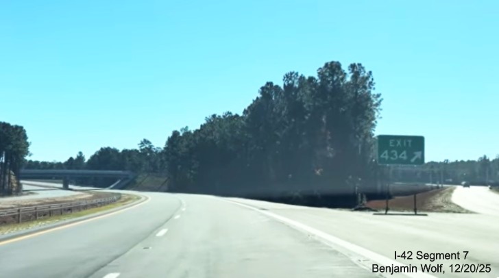 Image of gore sign for the Lake Road exit on the US 70 (Future I-42) East Havelock 
	Bypass, Screen grab from Benjamin Wolf video, December 2025