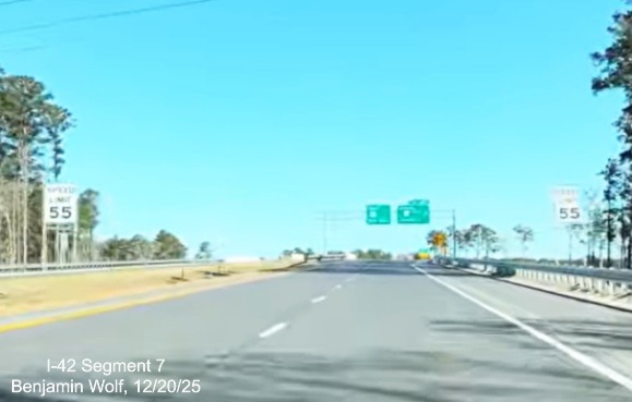 Image of a pair of Speed Limit 55 signs prior to the East Business 70 exit on US 
	70 (Future I-42) West Havelock Bypass, Screen grab from Benjamin Wolf video, December 2025
