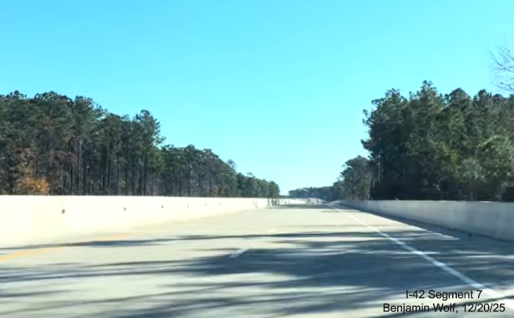 Image of passing over the longest bridge after the Lake Road exit on the US 
	70 (Future I-42) East Havelock Bypass, Screen grab from Benjamin Wolf video, December 2025