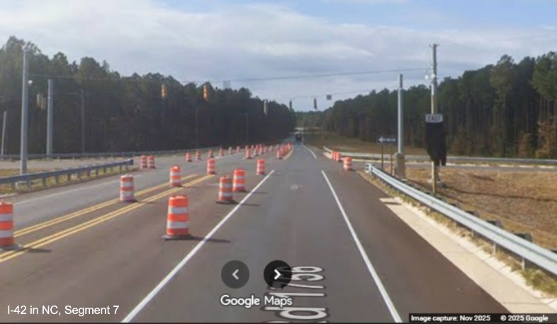 Image of Lake Road approaching covered over US 70 Bypass East trailblazer at future
	ramp to the Havelock Bypass, Google Maps Street View, November 2025