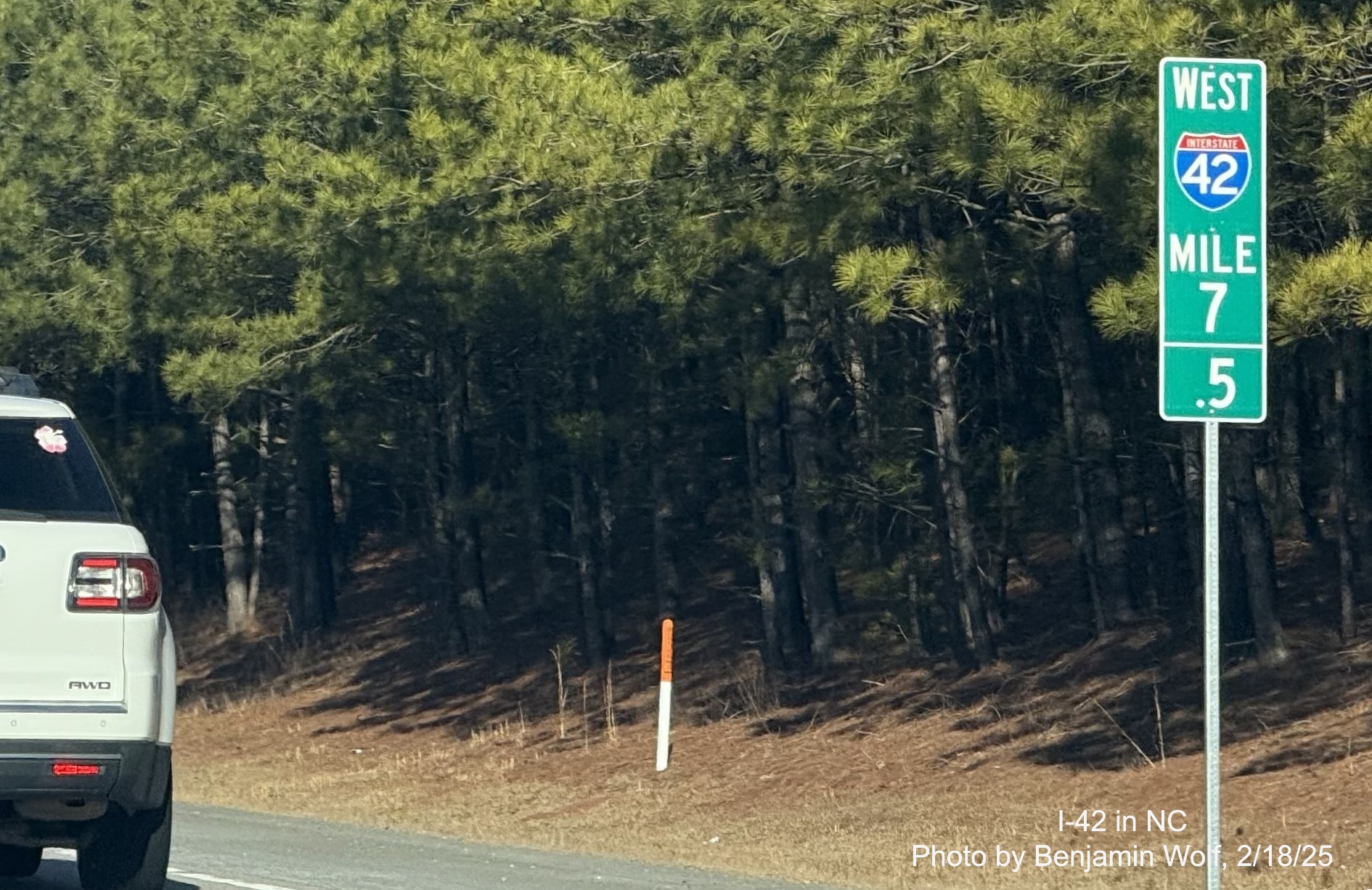 Image of new West I-42 Mile 7.5 marker prior to the current Ranch Road exit on
the Clayton Bypass, by Benjamin Wolf, February 2025