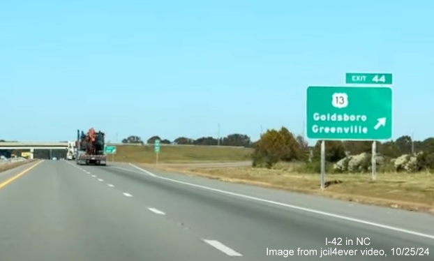 Image of renumbered exit sign for US 13 exit on I-42 West/Goldsboro Bypass, from jcil4ever video,
October 2024