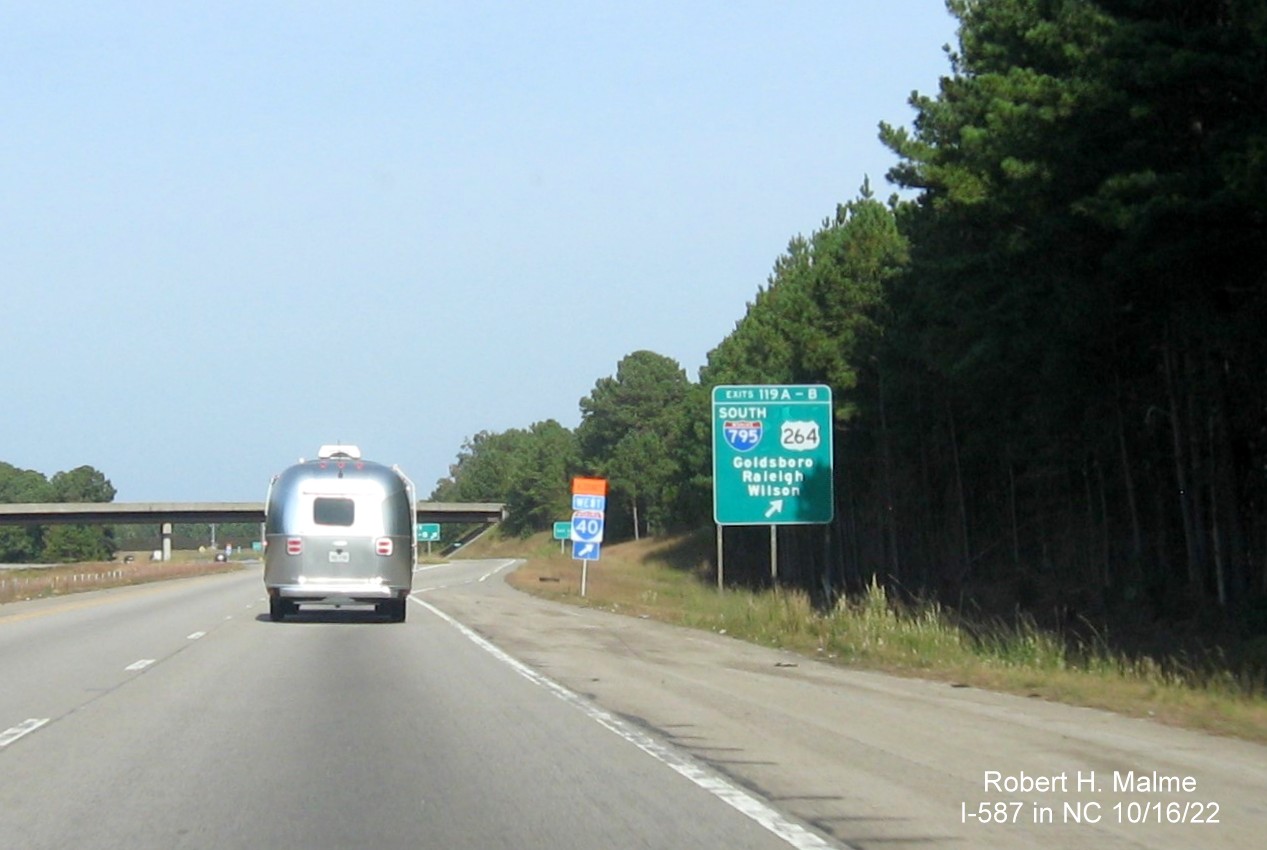 Image of exit sign for I-587/I-795/US 264 exit not updated to include I-587 shield on I-95 North 
                                       in Wilson,October 2022