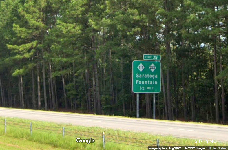 Image of ground mounted ramp sign for NC 91 exit on I-587 West with new I-587 milepost based exit number, Google Maps Street View, August 2022